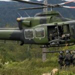 Di Tengah Ancaman Konflik, 11 Prajurit Koops TNI Habema Evakuasi Warga Ugimba dengan Dua Helikopter